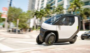Read more about the article Nimbus launches tiny EV prototype that’s like a motorbike with a roof – TechCrunch